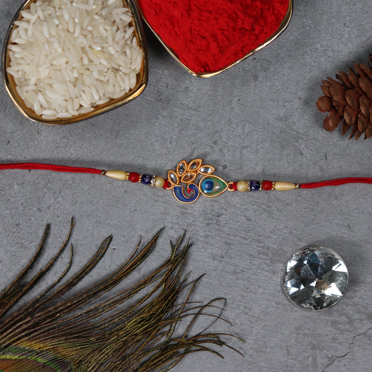 Artistic Mor Pankh Rakhi With Colorful Enamel And Traditional Thread Artistic Mor Pankh Rakhi With Colorful Enamel And Traditional Thread